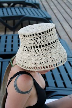 Embrace the latest trend with our handmade, unique Raffia Bucket Hat. Crafted from 100% environmentally friendly raffia yarn, this hat provides excellent sun protection while being incredibly light and comfortable. It's designed to keep you cool and prevent sweating even in the hottest weather. Perfect for poolside lounging, beach days, city outings, or any hot summer activity, this Raffia Bucket Hat effortlessly complements your trendy look. Versatile in style, you can wear it as a classic bucket hat or fold the brim up to sport a sailor hat look. MATERIAL: 100% natural raffia SIZE: Diameter: 20 cm (7.8 inches), suitable for standard adult size. COLOR: Personalize your hat by choosing your favourite colour, 14 colours available: Ivory; White Oak; Daffodil; Lemon; Green Tea; Mineral Green; Raffia Bucket Hat, Chocolate Delivery, Raffia Crochet, Summer Straw Hat, Sailor Hat, Crochet Bucket, Summer Activity, Crochet Bucket Hat, Hat Handmade