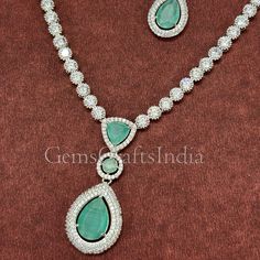 BEAUTIFUL AMERICAN DIAMOND NECKLACE SET *  Main Color : Sea Green * Skin Friendly : This Product does not contain harmful constituents. Anti-allergic safe for Skin. * Quality : Made from Premium Quality Material. This Product assures to remain in its Original Glory even after several usages.     . Actual Images of item are shown above, Please be aware of the actual colors may vary from the color shown on your screen, as monitor    settings may vary from individual to individual. . Welcome to Our Cubic Zirconia Emerald Necklace For Wedding, Dazzling Emerald Necklace For Wedding, Dazzling Round Emerald Necklace For Wedding, Hand Set Crystal Emerald Necklace For Wedding, Green Wedding Necklaces With Sparkling Stones, Wedding Emerald Crystal Necklace Hand Set, Wedding Silver Emerald Necklace With Cubic Zirconia, Wedding Silver Emerald Cubic Zirconia Necklace, Silver Round Emerald Necklace For Wedding