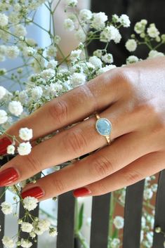 Beautiful 14k gold ring with a blue oval aquamarine gem for a woman.  This can be a great boho engagement ring or an elegant gold gift for Valentine's day for the woman you love! This 14k gold ring is a perfect, unique, modern ring for every woman. #aquamarine #aquamarinerings #bohowedding #engagementrings  #malkaravinajewelry Ring With Green Stone, Aquamarine Gold Ring, 14k Gold Ruby Ring, Boho Engagement Ring, Beautiful Gold Rings, Unique Gold Rings, Ruby Ring Gold, Green Tourmaline Ring, Solid Gold Bracelet