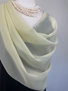 Elevate your style with our exquisite collection of chiffon shawls. Our chiffon shawls are the epitome of elegance and versatility, designed to effortlessly enhance your wardrobe and leave a lasting impression. Made from the fine poly chiffon fabric, these shawls offer a delicate and airy drape that adds a touch of grace to any outfit. Whether you're attending a special occasion, a casual gathering, or simply want to elevate your everyday look, our chiffon shawls are the perfect accessory. Choos Elegant Cream Scarf For Formal Occasions, Elegant Formal Dupatta With Traditional Drape, Elegant Evening Dupatta In Traditional Drape, Elegant Dupatta With Traditional Drape For Formal Occasions, Elegant Evening Dupatta With Traditional Drape, Elegant Silk Shawl Dupatta, Cream Silk Shawl For Wedding, Elegant Silk Dupatta Shawl, Elegant Cream Silk Dupatta