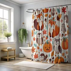 the shower curtain is decorated with owls and pumpkins