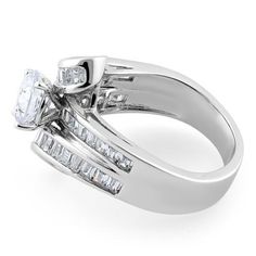 Top of ring height: 17mm

Band width: 6.8mm

Shank width: 4.7mm



Stone material: clear cubic zirconia

Center stone size: 7mm

Stone shape: round & baguette cut

Center stone carat weight: 1.28 ct

Total number of CZ stones: 41

Stone setting: prong & channel setting



Metal: 925 sterling silver

Plating: rhodium plated

Finish: high polish Channel Set Diamond Ring With Baguette Cut Cubic Zirconia, Baguette Cut Cubic Zirconia Diamond Ring With Channel Set, Baguette Cut Diamond Ring With Channel Set Cubic Zirconia, Channel Set Asscher Cut Cubic Zirconia Diamond Ring, Cubic Zirconia Diamond Ring With Baguette Diamonds, Cubic Zirconia Baguette-cut Ring With Center Stone, Treble Clef Ring, Channel Setting, Stone Material