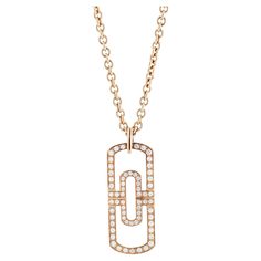 Bulgari Parentesi adjustable length diamond pendant necklace in 18k rose gold The pendant features 64 round brilliant cut diamonds totaling approximately 1.18 carat with F-G color and VS clarity. It measures 38mm (1.5") long and 16mm (0.63") wide. The chain is 3.4mm wide and can be worn at lengths of 20", 24" or 28". Signed Bvlgari. Made in Italy. 41.21 grams total. Bvlgari Pendant, Diamond Pendant Necklace, Round Brilliant Cut Diamond, Brilliant Cut Diamond, 18k Rose Gold, Diamond Pendant, Round Brilliant, Bulgaria, Or Rose