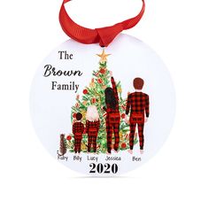 a family ornament hanging from a red ribbon on a white background with the words, the brown family