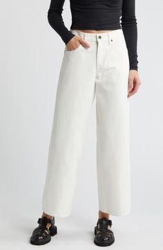 Relaxed yet dramatic, these white-washed jeans are cut from nonstretch organic-cotton denim in Los Angeles with a slouchy waist and full-length wide legs. 29 1/2" inseam; 22" leg opening; 10 1/2" front rise; 15" back rise (size 29) Zip fly with button closure Five-pocket style 100% organic cotton Machine wash, tumble dry Made in the USA of imported materials White Straight Leg Jeans For Spring, Chic White Denim Jeans, White Denim Jeans For Fall, Everyday White Cropped Leg Jeans, White Cropped Leg Jeans For Everyday, Spring White Five-pocket Pants, Classic White Bottoms For Everyday Wear, White Five Pocket Jeans For Spring, White High Rise Jeans For Fall