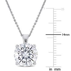 This shimmering created moissanite solitaire necklace is crafted in lustrous 14-karat white gold and features a round-cut, prong-set moissanite stone as its centerpiece in a classic solitaire pendant and chain design, perfect for all occasions. Elegance and sophistication at its finest, this four-carat gemstone necklace is sure to make a perfect versatile addition to any jewelry collection. Heart Flutter, Solitaire Necklace, Solitaire Necklaces, Pendant With Chain, Chain Design, White Necklace, Solitaire Pendant, Pendant Design, Online Jewelry Store