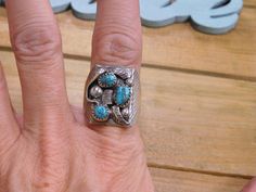 Sterling Silver Turquoise Rectangle Ring Size 9.5. We can resize for an additional fee, please email me with the size you need and I'll get back to you with a price. The face of the ring measures 20 millimeters in length and 14 millimeters across. An Awesome statement ring! Thank you for stopping by my shop, please come back soon Unique Rectangular Turquoise Ring, Rectangular Turquoise Ring For Anniversary, Rectangular Turquoise Rings For Anniversary, Anniversary Rectangular Turquoise Ring, Anniversary Turquoise Rectangular Ring, Rectangle Ring, Come Back Soon, Tucson Az, Please Come Back