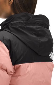 A retro North Face jacket based on a baffle-quilted, down-insulated design from 1996 offers unmatched warmth in cold weather. The durable ripstop shell with double-layer taffeta at the shoulders is perfect for backpacking, thanks to its packable design that can be stowed in its own pocket. 25" length (size Medium) Front zip closure Stowaway hood Adjustable cinch-cord hood Adjustable hook-and-loop cuffs Front zip pockets; interior zip pocket Lined, with 700-fill power goose down 50D 54 g/m² 100% The North Face Hooded Nylon Puffer Jacket, The North Face Nylon Puffer Jacket With Detachable Hood, The North Face Nylon Outerwear With Detachable Hood, The North Face Nylon Windbreaker For Winter, The North Face Windproof Nylon Outerwear, The North Face Nuptse 1996, Retro Nuptse Jacket, Nuptse Jacket, North Face Nuptse