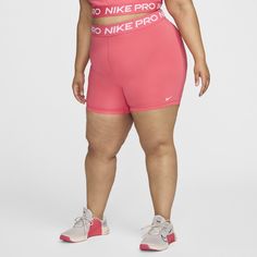 The Nike Pro 365 Shorts wrap you in stretchy fabric with Dri-FIT technology to keep you feeling supported and dry during intense workouts. This product is made with at least 50% recycled polyester fibers. Nike Activewear With Built-in Shorts And 4-way Stretch, Compressive Pink Athletic Shorts For Sports, Pink Moisture-wicking Athletic Shorts With 4-way Stretch, Moisture-wicking 4-way Stretch Pink Shorts, Pink Moisture-wicking 4-way Stretch Shorts, Pink 4-way Stretch Sports Shorts, Nike 4-way Stretch Go-dry Athletic Shorts, Nike Moisture-wicking Short Length Activewear, Nike Compression Moisture-wicking Athletic Shorts