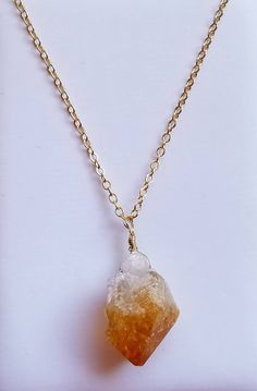 Raw Citrine Crystal Cluster Necklace, Orange Citrine Pendant Necklace, Gold Boho Bohemian Jewelry, Birthday Gift, Raw Stone Pendant Necklace This natural raw citrine cluster pendant necklace is suspended on a 14kt gold filled chain. Dress your jeans up with this stylish piece or wear long with your favorite sweater. This chic necklace goes great with just about anything. Whether a gift for yourself or your loved one, this necklace is sure to impress. This necklace also comes gift wrapped. Pendan Spiritual Citrine Pendant Necklace, Spiritual Citrine Birthstone Necklace, Adjustable Citrine Necklaces For Healing, Spiritual Yellow Crystal Necklace Gift, Spiritual Citrine Amber Necklace, Bohemian Gold Necklaces With Birthstone, Bohemian Gold Necklace With Birthstone, Bohemian Gold Birthstone Necklace, Bohemian Amber Citrine Necklaces