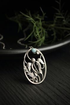 ITEM DESCRIPTION: The size of the pendant - 3х4 cm (about 1 x 1 1/2 inches), weight 4g. You can buy it with the chain or without it. There is a silver loop for the chain on the backside so you can use even a wide chain. I made this pretty pendant of sterling silver, natural larimar, and blue moonstone. There is a whole sea world inside the oval frame: tiny turtle, algae and blue stones. This is a transparent and touching world of the warm sea. I'm sure this silversmithing jewelry will be a great Ursula Jewelry, Wax Carving Jewelry, Summer Pendant, Silversmithing Jewelry, Wire Wrap Cabochon, Sea Jewelry, Tiny Turtle, Turtle Charm, Turtle Necklace