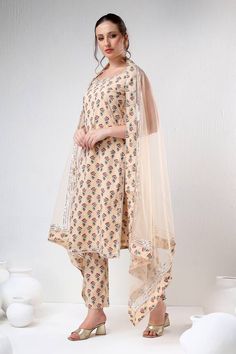 Beige straight kurta with all over floral prints. Paired with coordinating pant and dupatta. - Aza Fashions Traditional Beige Sets With Digital Print, Beige Straight Kurta Sets For Summer, Cotton Sets With Sheer Dupatta For Summer, Summer Wedding Printed Dupatta, Fitted Kalamkari Print Sets For Summer, Traditional Beige Dupatta For Summer, Fitted Beige Sets With Digital Print, Beige Cotton Sets With Digital Print, Summer Cotton Sets With Sheer Dupatta