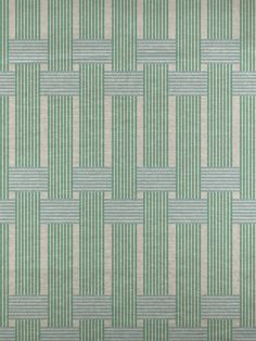 a green and white wallpaper with small squares on the top, in different colors