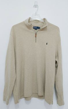 BRAND: POLO RALPH LAUREN SIZE: XXL STYLE: Long Sleeve COLOR: Beige (Blue pony) FEATURES: Long sleeve half zip closure sweater. MATERIAL: 100% Cotton.  CRAFTED: Made in China.  CONDITION: Good pre-owned condition. SUMMARY: POLO RALPH LAUREN BEIGE W/ BLUE PONY HALF ZIP PULLOVER SWEATER. Size XXL. Condition is Pre-owned. Shipped with USPS Priority Mail. Polo Ralph Lauren Half Zip Sweater, Beige Half-zip Sweater, Ralph Lauren Half Zip, Ralph Lauren Quarter Zip, Polo Quarter Zip, Polo Ralph Lauren Sweater, Quarter Zip Sweater, Striped Sweatshirts, Levi’s 501