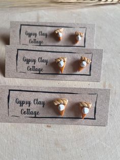 three different types of clay clay earrings