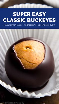 a close up of a chocolate covered cookie in a paper plate with the title super easy classic buckeyes