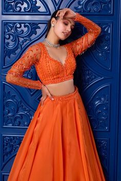 Orange attached cancan lehenga with embroidered waistband. Paired with sequin, glass bead, stone, cutdana embroidered padded blouse and dupatta. - Aza Fashions Fitted Hand Embellished Sets For Navratri, Fitted Hand Embellished Dress For Navratri, Navratri Fitted Hand Embellished Choli, Hand Embellished Fitted Organza Choli, Fitted Hand Embellished Lehenga For Diwali, Fitted Hand Embellished Sets For Festivals, Hand Embellished Fitted Sets For Festivals, Fitted Hand-embellished Sets For Festivals, Hand Embellished Fitted Festival Sets