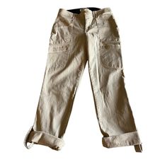 These Democracy Women's Khaki Cargo Cropped Pants in size 8 offer a stylish blend of utility and comfort. Featuring a mid-rise waist and practical cargo pockets, these cropped pants provide a casual, laid-back look perfect for everyday wear. The soft, stretchy fabric ensures a comfortable fit, while the khaki color makes them versatile for pairing with various tops and shoes. Ideal for a chic, on-the-go style. Womens Khakis, Womens Jeans, Khaki Color, Style Chic, Stretchy Fabric, Cropped Pants, Mid Rise, Porter, Everyday Wear