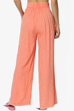 Discover the perfect blend of boho-chic and comfort with these Washed Linen Wide Leg Pants.Their elastic waistband and frayed hem offer a relaxed, yet stylish fit that moves with you.Crafted from a breathable linen blend, these versatile slacks are a must-have for effortless summer style.Dress them up for work or keep it casual for a weekend getaway. With slant pockets for convenience and a timeless wide-leg design, these full-length pants are ideal for every occasion.Trendy Wide Leg Pants: Capt Summer Vacation Wide Leg Pants With Pull-on Style, Summer Wide Leg Pants With Frayed Hem, Trendy Rayon Bottoms For Loungewear, Casual Ankle-length Harem Pants For Beach, Trendy Rayon Bottoms For Vacation, Spring Beach Ankle-length Pants, Trendy Rayon Bottoms For Spring, Chic Wide-leg Pants With Frayed Hem, Ankle-length Beach Pants For Spring