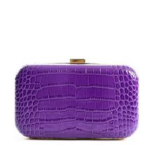 Purple Show stopping croc embossed leather clutch for any occasion Fits all phone sizes up to an iPhone 11 Pro and Samsung Galaxy Note 10+ Croc embossed Italian leather with gold hardware Removable gold curb style chain, 21” drop Gold Snap closure Signature pink cotton lining one interior slip pocket Dust bag included Dimension: 8.25W x 4.5H x 2D Elegant Rectangular Crocodile Pattern Clutch, Trendy Rectangular Formal Wallets, Elegant Rectangular Clutch With Crocodile Pattern, Leather Clutch With Crocodile Pattern, Leather Clutch With Crocodile Pattern, Rectangular, Luxury Purple Rectangular Evening Bag, Evening Clutch With Crocodile Pattern, Elegant Mobile Phone Wallet, Elegant Rectangular Wallet With Mobile Phone Bag