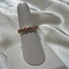 Red Evil Eye Gold Filled Ring. Runs True To Size. Brand New And Never Worn. Available In Sizes 610. Trendy Red Stackable Jewelry, Red Evil Eye, Gold Filled Ring, Ring Color, Womens Jewelry Rings, Red Gold, Evil Eye, Gold Filled, Women Jewelry