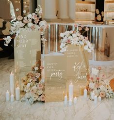 the table is set up with flowers and candles