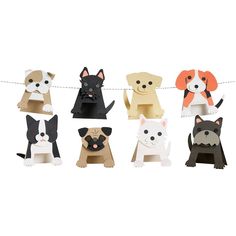 paper cutouts of dogs and cats hanging on a line with clothes pins attached to them