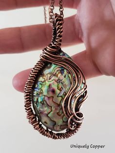 This gorgeous copper wire wrapped, abalone shell, pendant necklace, is the perfect wife gift for her, for your 7th or 22nd Wedding Anniversary, Copper Anniversaries! The abalone shell pendant has been wire wrapped in copper and then antiqued and buffed to a brilliant shine. It measures 3 inches long and 1 3/4 inches wide and comes with a copper chain necklace. (Choose your desired length of necklace from the drop down menu) Photographed with a 20 inch copper chain necklace. Please visit my shop Artisan Abalone Shell Necklace For Gift, Wire Wrapped Abalone Shell Jewelry For Gifts, Handmade Abalone Shell Round Pendant Jewelry, Abalone Shell Round Pendant Jewelry Gift, The Perfect Wife, 22nd Wedding Anniversary, Copper Artwork, Copper Ornaments, Copper Chain Necklace