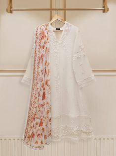 Agha Noor embroidered suit with floral dupatta Summer Wedding Unstitched Cambric Suit, Summer Wedding Cambric Unstitched Suit, Unstitched White Traditional Wear For Spring, White Unstitched Suit With Floral Embroidery And Long Sleeves, Semi-stitched White Set With Dabka, Semi-stitched White Sets With Dabka Details, White Cambric Salwar Kameez With Long Sleeves, White Lawn Suit With Dabka Work Straight Kurta, Floral Embroidered Cambric Anarkali Set For Eid