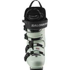 the salmon ski boots are white and black