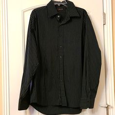 Mens Button Down Shirt That Is A Size Xxl. It Is Like Brand New. Black With A Gray Pin Stripe. Black Business Shirt With Buttons, Black Button-down Shirt For Business, Black Buttoned Shirt For Business, Black Business Shirt With Button Closure, Black Collared Dress Shirt With Button Closure, Casual Black Long Sleeve Dress Shirt, Black Button-up Business Shirt, Black Button-up Shirt For Business Casual, Black Business Shirt