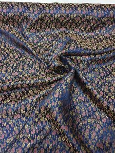 a blue and pink floral print fabric