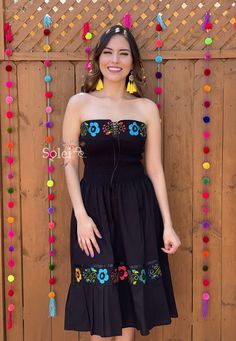 This Beautiful Strapless Dress boasts a Traditional Mexican floral design combined with a modern style dress. The pleated skirt combined with the strapless top makes it fun and flirty. It's made out of fine Mexican cotton and has elastic around the waist for a tighter fit. This dress is handmade and hand embroidered by Mexican Artisans in Oaxaca, Mexico. This dress comes in one size: Small/Medium Purchase the shoes modeled here: https://www.etsy.com/es/listing/796861329/zapato-artesanal-de-plata Strapless Summer Festival Dresses, Black Embroidered Dress For Fiesta In Spring, Black Bohemian Strapless Dress, Black Strapless Bohemian Dress, Black Bandeau Dress For Spring, Fitted Strapless Festival Dress, Fitted Strapless Dress For Festival, Strapless Fitted Dress For Festival, Black Embroidered Summer Dress For Fiesta