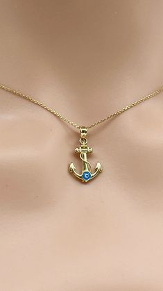 The anchor necklace meanings are safety and security or trust and confidence.  Evil Eye is used to ward off variations of evil intentions. Sold as Pendant Only or with Chain. Details: Gold: 10K Solid Gold  Stye: Anchor with Evil Eye  Size: 12x22mm with bail included  Weight: 0.90g approximately  Chain: 1mm Diamond Cut Cable Chain  Length: 16-24 inches  Condition: New and Inspected for Quality Assurance  Please understand that the photos are ENLARGED to show detail for your benefit- please use th Necklace Meanings, Anchor Necklace, Birthday Gift For Women, Protection Amulet, Solid Gold Necklace, Women Christmas, Eye Pendant, Evil Eye Pendant, Surprise Gifts