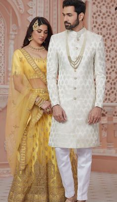 Details : Color- cream Any Color you may ask for...(only one color) Fabric -Imported Fabric Work Details -self Bottom Details Color White-- Pajama Package Include : Top , Bottom,, All others accessories are for photography purpose only . Just the Top and bottom available . Color variation may be there slightly , due to computer resolution and camera . Sherwani Groom Wedding, Indo Western Sherwani, Sherwani Groom, Fabric Work, Wedding Party Wear, Tamil Wedding, White Pajamas, Yellow Saree, Ethnic Dress