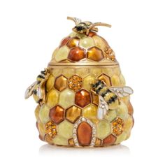 a honey jar with two bees on it