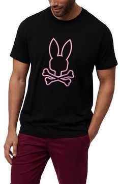 A colorful bunny pops in dimensional embroidery from the front of a T-shirt made for enjoying your days and nights in the comfort of premium cotton. 27" length (size 4) Crewneck Short sleeves 100% pima cotton Machine wash, line dry Made in Peru Casual T-shirt With Bunny Design And Crew Neck, Casual Cotton T-shirt With Bunny Print, Casual Crew Neck T-shirt With Bunny Design, Pink Crew Neck Top With Bunny Design, Summer Cotton Tops With Bunny Design, Summer Cotton Top With Bunny Design, Casual Bunny Design T-shirt For Spring, Cotton T-shirt With Bunny Print For Spring, Spring Cotton T-shirt With Bunny Design