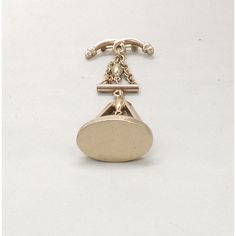 This is part of Chairish’s Costume Jewelry assortment.  Pale goldtone pendant brooch with security clasp. Marked "Monet." Measures: 2 15/16 inches long by 1 inch wide. Condition: Very good; light age-appropriate wear. This was featured in a 1950 Monet ad (see photo). Originally this brooch could have been worn alone or as an extension of the necklace it came with. However, I've been selling Monet for more than 10 years and have yet to see the complete necklace with the brooch. Antique Pendant Brooch Hallmarked, Monet Jewelry Vintage, Antique Clip-on Brooches For Gifts, Gold Clip-on Costume Jewelry Brooch, Vintage Gold Multi-stone Brooches, Costume Jewelry, Gold Tones, Things To Come, Pendant