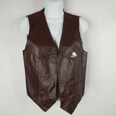 "Brand: Jordache Size: S Vintage leather vest from the 70's/80's Genuine leather Open front Burgundy back and lining White Jordache logo on chest One (1) small waist pocket Measurements: Bust: 16\" Shoulder to hem (front): 21\" Back collar to hem: 17.5\" No defects noted." Retro Vest With Pockets, Vintage Fitted Leather Vest, Fitted Vintage Leather Vest, Vintage Leather Vest, Vintage Ski Jacket, Hot Rollers Hair, Open Front Vest, Horse Logo, Vest Outfits