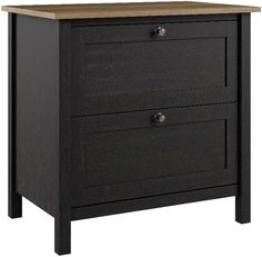 a black dresser with two drawers on one side and a wooden top, against a white background