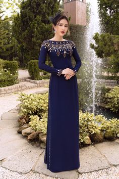 Long Sleeve Embellished Evening Dress For Festive Occasions, Elegant Dress With Embroidered Neckline For Eid, Festive Evening Dress With Embroidered Neckline, Formal Anarkali Embellished Evening Dress, Long Sleeve Embellished Gown For Eid, Embellished Long Sleeve Gown For Eid, Fitted Embellished Gown For Eid, Fitted Hand Embellished Dress For Eid, Floor-length Evening Dress With Embroidered Neckline