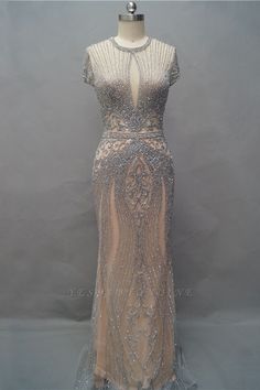 Gala Evening Dress With Rhinestones And Mermaid Hem, Mermaid Hem Evening Dress With Rhinestones For Gala, Rhinestone Mermaid Hem Gown For Prom, Mermaid Dress With Rhinestones For Prom Season, Rhinestone Mermaid Dress For Prom Season, Rhinestone Mermaid Dress For Prom, Glamorous Crystal-embellished Mermaid Dress For Prom, Floor-length Rhinestone Evening Dress For Homecoming, Floor-length Sparkling Mermaid Dress For Prom