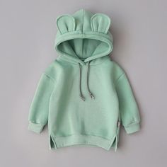 Playful Long Sleeve Cartoon Print Hoodie, Cute Fleece Hoodie With Cartoon Print, Cotton Hoodie With Cartoon Print, Playful Long Sleeve Fleece Hoodie, Playful Fleece Hoodie With Long Sleeves, Playful Hooded Fleece Sweatshirt, Playful Cotton Hoodie For Playtime, Playful Winter Sweatshirt With Drawstring Hood, Cute White Hoodie For Playtime