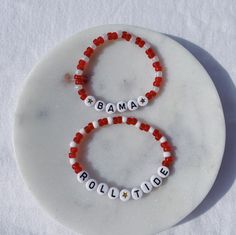 Show your school pride and complete your game day outfit with a custom crimson and white beaded bracelet for the University of Alabama! School Spirit Letter Beads Bracelets Gift, White Team Spirit Stretch Bracelet As Gift, White Team Spirit Jewelry For Gifts, White Team Spirit Stretch Bracelet, White Team Spirit Jewelry As A Gift, White Team Spirit Jewelry Gift, School Spirit Beaded Bracelets With Letter Beads For Gifts, School Spirit Beaded Bracelet With Letter Beads As Gift, Customizable White Wristband For Game Day