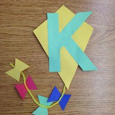 the paper is cut out to make a kite