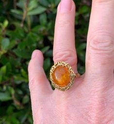 "Vintage Beautiful Amber Ring in Stunning Filagree 18ct gold. Please look carefully the photographs as we have taken care to capture any quirks or \"imperfections\" - all our items are commensurate with the age. Vintage and antique jewellery is unlikely to be absolutely perfect, but that's why it's so charming!  Our beautiful silver, gold and platinum rings can be resized for an additional cost - please see our \"Ring Resizing\" listing in our shop and read the description carefully.  Items come Gold Oval Gemstone Filigree Ring, Gold Filigree Ring With Prong Setting As Gift, Amber Hallmarked Fine Jewelry Rings, Amber Hallmarked Rings In Fine Jewelry Style, Antique Gold Solitaire Jewelry, Amber Hallmarked Promise Ring, Ornate Yellow Gold Filigree Ring With Gemstone, Ornate 14k Gold Rings For Gift, Amber Round Rings For Wedding