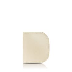 The Half Moon Wallet embodies the essence of minimalist design. Its clean lines and graceful curves showcase the quality of its materials; Full-grain cattle leather; Polyester lining; Gold-tone metallic pieces; Button closure; 1 bill compartment; 3 credit card slots; 1 coin compartment with zipper; Size: 5.5"W x 3.6"H x 0.6"D; Weight: 0.2 lbs