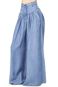 Super wide-leg pants with a high-rise, fitted waist. Drop-waist pleating around the hips with pockets on the sides. Light-weight chambray material flows and drapes to create flattering silhouette. CARE | Machine Wash Cold CONTENTS | 100% Tencel MEASUREMENTS | 42"/107 cm Top to Bottom 29"/74 cm Inseam (Size Small) MODEL | 5'8 - wearing a size Small IMPORTED Denim Flare Pants, Hippie Chick, Baggy Trousers, Casual Wide Leg Pants, Pantalon Large, Loose Pants, Wide Pants, Denim Flares, Komplette Outfits