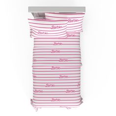 two pink and white striped bedspreads with the word barbie written on each side