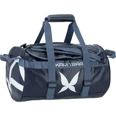 a blue duffel bag with white birds on it and the words kartura